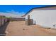 Backyard showing A/C unit and gravel, easy to maintain at 7707 E Garnet Ave, Mesa, AZ 85209