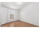 Bright bedroom with vinyl flooring and a window to let natural light at 7707 E Garnet Ave, Mesa, AZ 85209