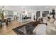 Spacious open-concept living room with hardwood floors and lots of natural light at 7770 E Camelback Rd # 11, Scottsdale, AZ 85251