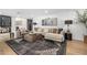 Elegant living room features a modern sectional, area rug, and stylish decor at 7770 E Camelback Rd # 11, Scottsdale, AZ 85251