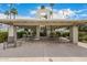 Charming outdoor patio area with seating, ideal for gatherings and enjoying the community amenities at 7770 E Camelback Rd # 11, Scottsdale, AZ 85251