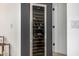 Built-in wine fridge with a glass door at 7770 E Camelback Rd # 11, Scottsdale, AZ 85251