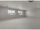 Spacious upstairs bonus room with neutral paint and carpet at 9618 E Monterey Ave, Mesa, AZ 85209