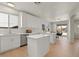 Bright kitchen with stainless steel appliances and an open layout with access to the backyard patio at 9618 E Monterey Ave, Mesa, AZ 85209