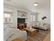 Cozy living room with neutral tones, stylish furniture, and natural light, perfect for relaxing or entertaining guests at 9618 E Monterey Ave, Mesa, AZ 85209