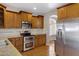 Kitchen boasting granite countertops and stainless steel appliances at 9665 E Nido Ave, Mesa, AZ 85209