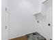 Bright laundry room with washer/dryer hookups and ample space for laundry needs at 9665 E Nido Ave, Mesa, AZ 85209