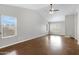 Spacious living room with vaulted ceiling and multiple windows allowing ample natural light at 9665 E Nido Ave, Mesa, AZ 85209