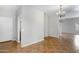 Spacious living area featuring tile flooring and neutral wall colors at 9665 E Nido Ave, Mesa, AZ 85209