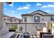 Cozy outdoor balcony seating area with views of the neighborhood and blue skies at 9906 E Wavelength Ave, Mesa, AZ 85212