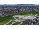 Aerial view of a modern skate park in a community, surrounded by lush landscaping and neighborhood homes at 9906 E Wavelength Ave, Mesa, AZ 85212