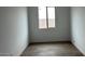 Cozy bedroom features a well-lit window and neutral-toned walls at 15146 W Gray Fox Trailer, Surprise, AZ 85387