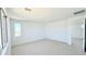 Bright bedroom with carpet flooring, natural light, and a nearby doorway, awaiting personalization at 15146 W Gray Fox Trl, Surprise, AZ 85387