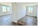 Bright living area featuring tile flooring, neutral walls, and large windows offering lots of natural light at 15146 W Gray Fox Trl, Surprise, AZ 85387