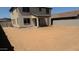 Large dirt backyard with ample space for outdoor activities and entertaining at 15151 W Gray Fox Trl, Surprise, AZ 85387