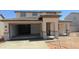 Two story home with a two car garage and desert landscaping at 15151 W Gray Fox Trl, Surprise, AZ 85387