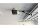 Overhead garage door opener with safety features and remote operation at 15151 W Gray Fox Trl, Surprise, AZ 85387