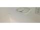 Garage light fixture with an electrical outlet at 15151 W Gray Fox Trl, Surprise, AZ 85387