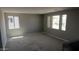 Bright living space with natural light streaming through multiple windows at 15151 W Gray Fox Trl, Surprise, AZ 85387