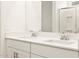 Close up of the bathroom featuring dual sinks and lots of counter space at 16015 W Desert Hollow Dr, Surprise, AZ 85387