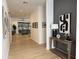 Welcoming entryway with light hardwood flooring and open access to the living area at 4235 E Turney Ave, Phoenix, AZ 85018