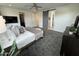 Comfortable main bedroom with plush carpeting, neutral decor, and a modern ensuite bathroom at 4235 E Turney Ave, Phoenix, AZ 85018