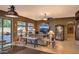 Inviting living room features a ceiling fan, neutral colors, outside views, and seamless access to outdoor spaces at 6833 N 71St Dr, Glendale, AZ 85303