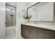 Modern bathroom with sleek vanity, large mirror, and a separate tub and shower area at 100 W Northern Ave # 6, Phoenix, AZ 85021
