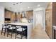 Modern kitchen showcasing a large island with seating, sleek appliances, and ample storage space at 100 W Northern Ave # 6, Phoenix, AZ 85021