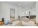 Open concept living area with natural light and neutral tones, perfect for relaxation and socializing at 100 W Northern Ave # 6, Phoenix, AZ 85021