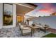 Inviting outdoor patio with comfortable seating, grill, and stunning sunset views at 100 W Northern Ave # 6, Phoenix, AZ 85021