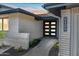 Charming entryway with a paved walkway leading to a modern front door at 1012 E Magdalena Dr, Tempe, AZ 85283