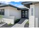 Charming entryway with a paved walkway leading to a modern front door at 1012 E Magdalena Dr, Tempe, AZ 85283