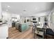 Open kitchen leads to the living and dining areas, creating a welcoming and connected living space at 1012 E Magdalena Dr, Tempe, AZ 85283