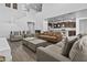 Open-concept floorplan with soaring ceilings connects the living and kitchen areas, creating an airy and inviting space at 10792 W Whitehorn Way, Peoria, AZ 85383