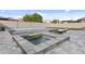 This backyard pool and spa feature a clean modern design and plenty of space for entertaining at 10792 W Whitehorn Way, Peoria, AZ 85383