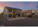 Two story home with solar panels, balcony, and gravel backyard at 10866 S Dreamy Dr, Goodyear, AZ 85338