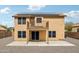 Spacious backyard featuring a second-story balcony, solar panels, and a covered patio at 10866 S Dreamy Dr, Goodyear, AZ 85338