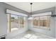 Bright dining area with two large windows offering natural light at 10866 S Dreamy Dr, Goodyear, AZ 85338