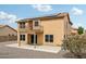 Exterior of the home featuring a second-story balcony and private backyard at 10866 S Dreamy Dr, Goodyear, AZ 85338