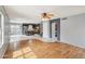 Spacious living room with seamless access to the modern kitchen area at 10866 S Dreamy Dr, Goodyear, AZ 85338