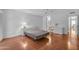 Bright, spacious bedroom with wood floors at 11465 N 56Th St, Scottsdale, AZ 85254