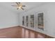 Living room with hardwood floors and outdoor access at 11465 N 56Th St, Scottsdale, AZ 85254