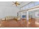 Bright living room features hardwood floors, high ceilings, and an open floor plan at 11465 N 56Th St, Scottsdale, AZ 85254