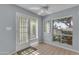Bright sunroom with tiled floors and a backyard view at 11465 N 56Th St, Scottsdale, AZ 85254