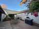 Inviting backyard patio with barbecue, and shade covering, perfect for outdoor gatherings at 12221 S Paiute St, Phoenix, AZ 85044