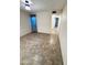 Bedroom featuring tile flooring and large window at 12221 S Paiute St, Phoenix, AZ 85044