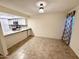 Open-concept kitchen featuring granite counters and tile flooring, connecting to a dining area at 12221 S Paiute St, Phoenix, AZ 85044