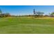 Beautifully manicured golf course with mature trees at 12353 W Running Deer Trl, Peoria, AZ 85383