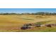 Well-maintained golf course featuring sand traps and a vibrant green flag at 12353 W Running Deer Trl, Peoria, AZ 85383